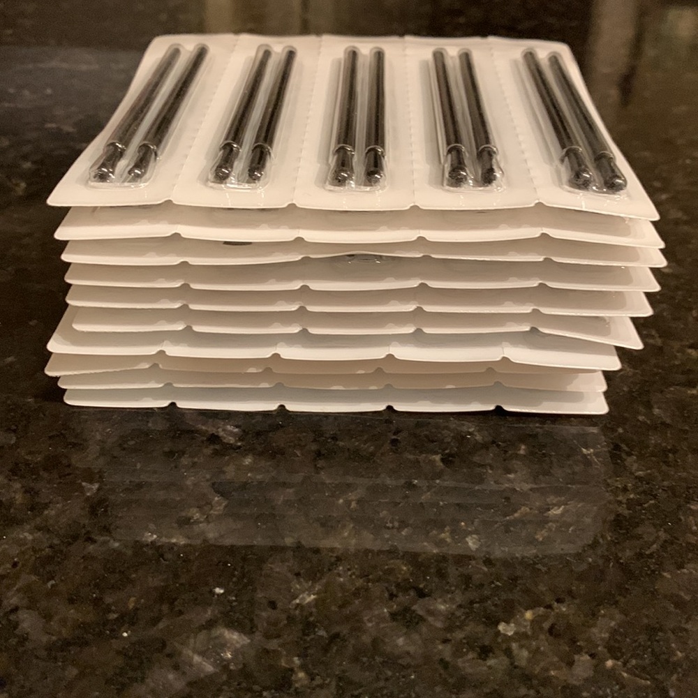 Ten packages of small brushes for eyes